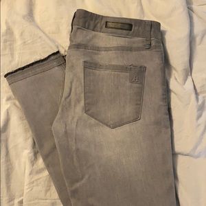 Distressed raw cuff gray jeans